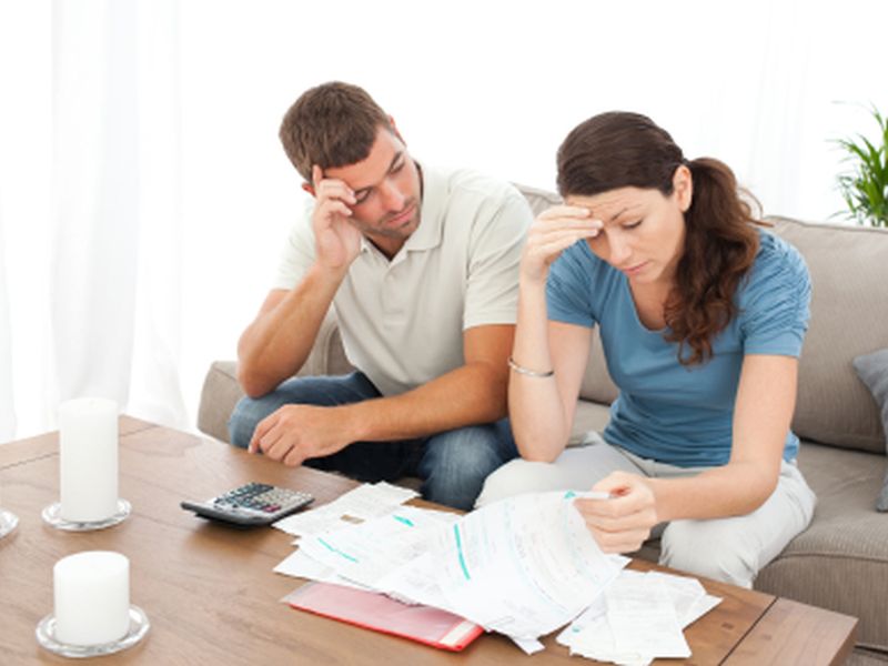 Couple calculating expenses